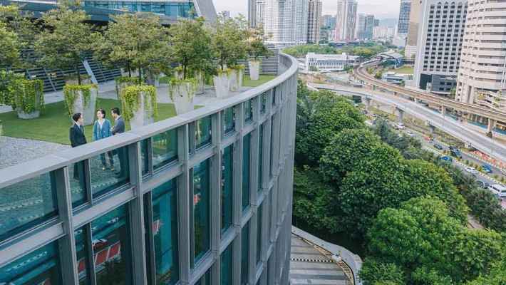 Real estate high rise glass building in a smart city