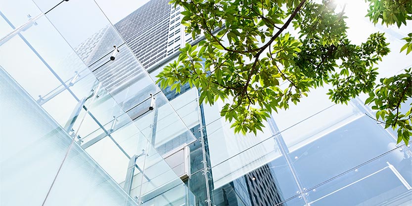 looking up at a high-rise office building.