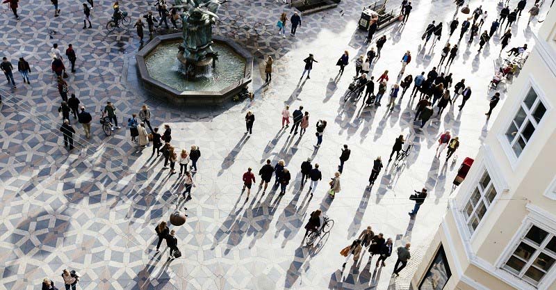 Aerial view of people walking in an open space