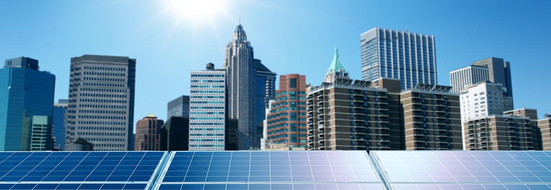 View of skyscrappers along with solar panels 